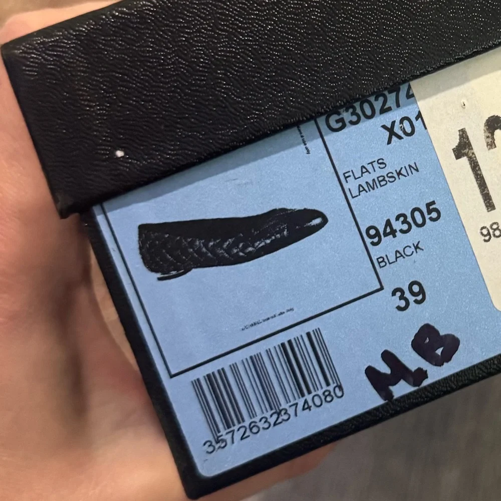 CHANEL Black Quilted Leather Ballet Flats